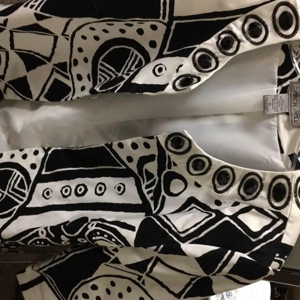 White and black blazer